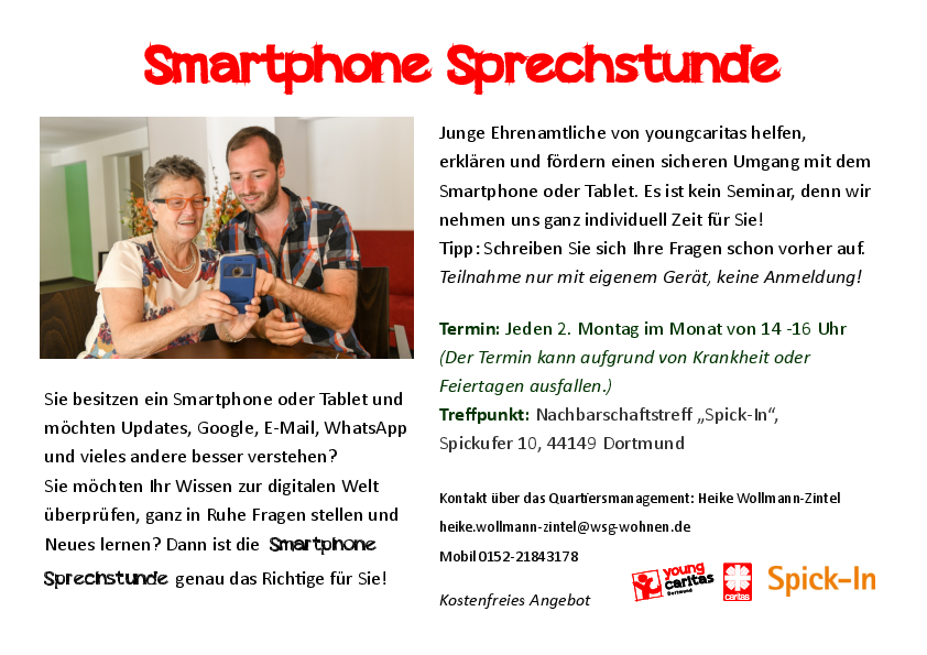 Junge Menschen erklären Senioren das Smartphone